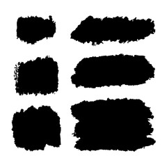 Collection of Black Brush Strokes and Ink Blotches for Creative Projects