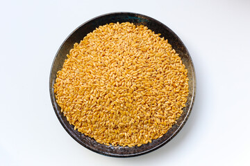 Organic golden flaxseeds, rich in omega-3, fiber, and antioxidants