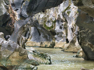 Klong Hin Dam River, natural black stone tunnel