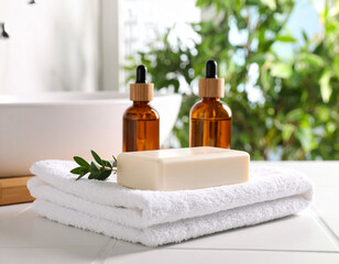 Obraz premium Luxurious Spa Essentials Organic Soap, Essential Oils, and Soft Towels for a Relaxing Bathroom Experience