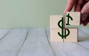 Wooden economy and currency unit on a craft background.
