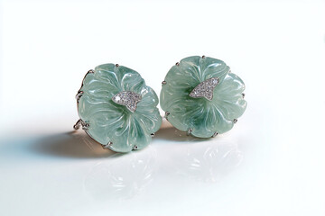A photorealistic icy jadeite earring set with wave engravings and a pale green hue