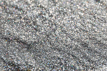 Shiny silver glitter as background, closeup