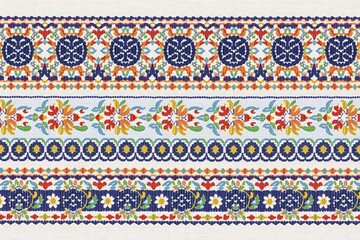 A vibrant textile pattern featuring intricate floral and geometric designs in various colors on a light background.