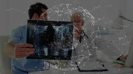 Junior doctor lifting X-ray film to review data, senior doctor consulting, network globe fading in - Powered by Adobe