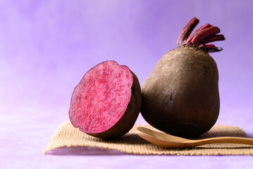 Fresh beetroot on purple background, Organic vegetable
