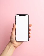 Hand Holding Smartphone Mockup with Blank Screen on pink Background