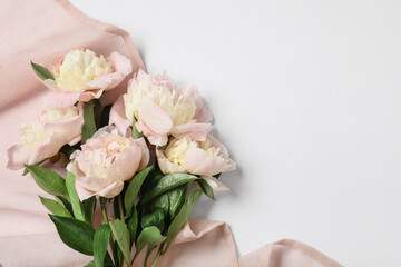 Beautiful peony flowers on grey background