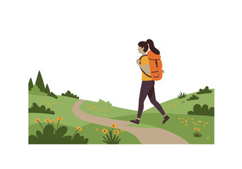 A hiker with a backpack walks a path through a grassy flowered landscape