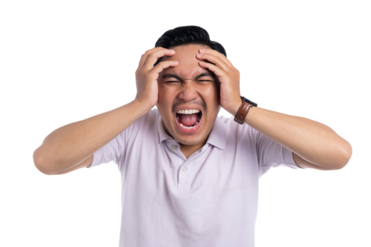Stressed young man screaming with hands on head showing frustration and mental breakdown isolated on transparent background