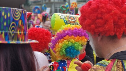 carnival parade people dancing many colours balloons in katsika greece