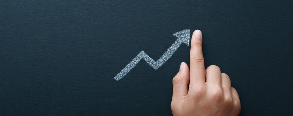 Hand Pointing at Upward Trend Graph Sketch on Dark Background for Business Growth and Success Concepts
