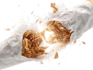 A cigarette has been broken in half, with the ash and smoke spilling out