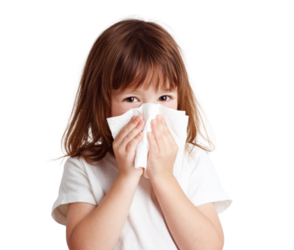 A young girl is holding a tissue to her face, possibly because she has a cold