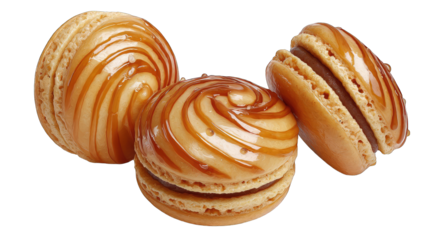 Three caramel-glazed macarons, stacked