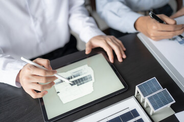 Solar panels green energy Business man working green eco friendly office business creative idea...