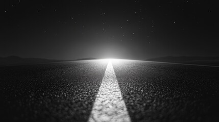 Night road ahead with bright light at the end.