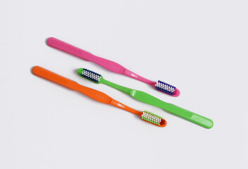 Multicolor toothbrushes with soft bristles, designed for gentle and sensitive gums. Bristles split into fine ends for increased contact area.