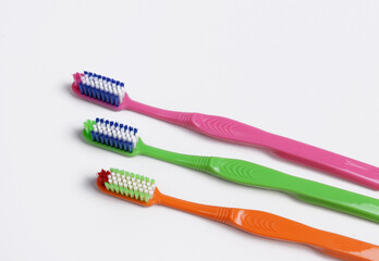 Multicolor toothbrushes with soft bristles, designed for gentle and sensitive gums. Bristles split into fine ends for increased contact area.
