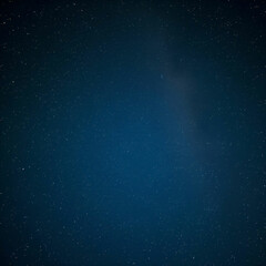 Fototapeta premium Vertical View of Stunning Starry Night Sky Sparkling Above