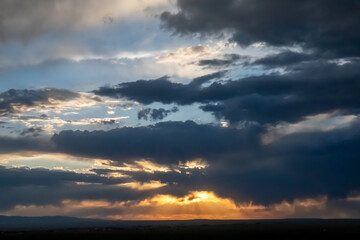 Stormy sunset with dark clouds in Wyoming 