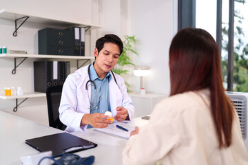 Medical Consultation: A doctor in a bright clinic discusses medication with a patient, illustrating healthcare support.