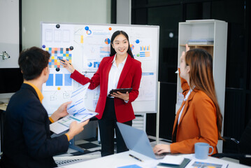 Happy businesspeople while collaborating on a new project in an office. Group of diverse businesspeople
