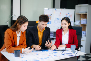 Young business creative team are brainstorming planning discussing while sitting in creative business discussing work