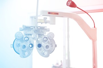 Phoropter for eye test, lenses glasses for eye check in optical store, health care, eye care concept, industry eye care 