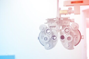 old sewing machine, Phoropter for eye test, lenses glasses for eye check in optical store, health care, eye care concept, industry eye care 