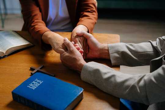 Woman's hand with cross .Concept of hope, faith, christianity, religion, church