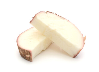 Close up of a yuca root isolated on a white background