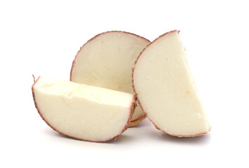 Close up of a yuca root isolated on a white background