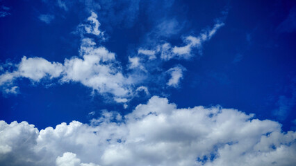 Dramatic Blue Sky with Fluffy Cumulus Clouds