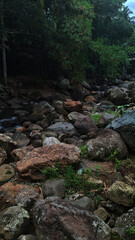 river in the mountains with large rocks