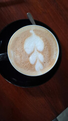 cup of cappuccino with cinnamon