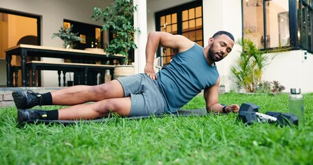 Fitness, side plank and man outdoor for workout, training or stretching for core strength. Health, wellness and male person with smart watch and weights for exercise for ab muscles in backyard. - Powered by Adobe