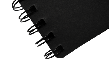 black spiral notebook on white