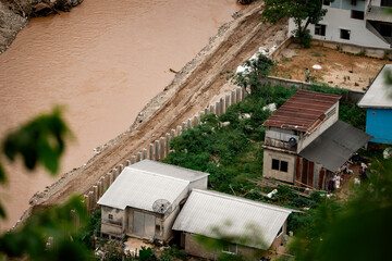 An aerial view of the Thai-Myanmar border during the construction of flood barriers by both Thailand and Myanmar to prevent flooding.
