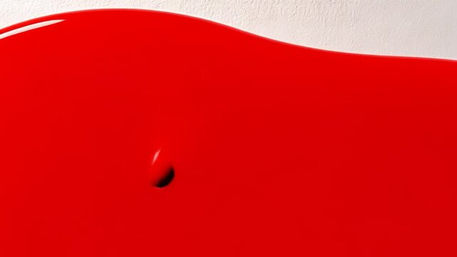 Abstract glossy red shape on textured white surface modern design backdrop