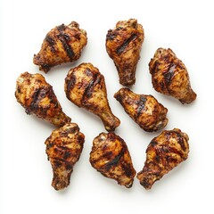 Grilled Chicken Drumsticks on a White Plate Perfect for Barbecue, Picnic, or Family Dinner and Deliciously Seasoned Meal