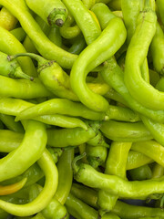 lots of chili peppers for cooking as background