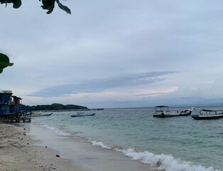 Summer beach landscape. Tropical island paradise. Exotic coast, coconut trees, pristine sea, blue...