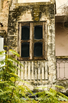 A close-up of an old window in the old city of Hanoi in Vietnam