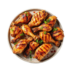 Grilled chicken drumsticks on a platter.