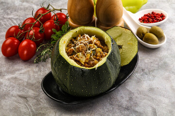 Baked round zucchini with meat
