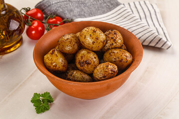 Baked mini potato with herbs