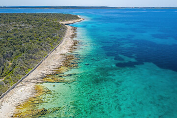 Blue waters in the shallows of Molat Island in Croatia