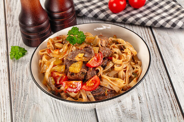 Asian udon noodles with beef