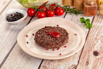 Grilled juicy beef cutlet for burger
